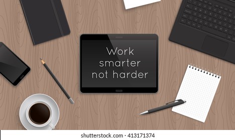 'Work smarter not harder' motivational and inspirational headline in tablet. Quote on the realistic office desktop top view with laptop, bloknot and diary and smartphone and coffee.