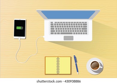 work space concept mobile device charging on laptop vector illustrator