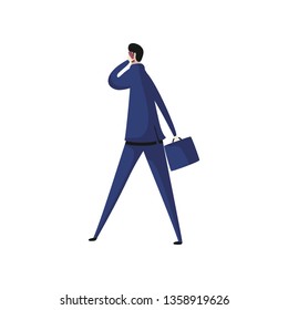 Worker in blue suit talking on phone back view.