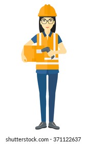 Worker checking barcode on box.
