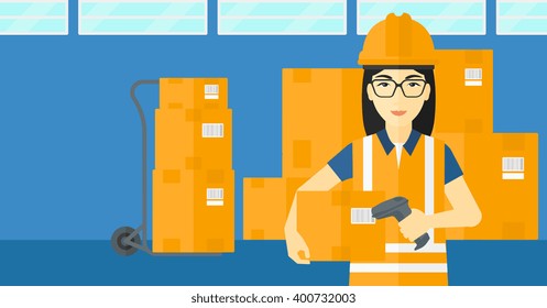 Worker checking barcode on box.