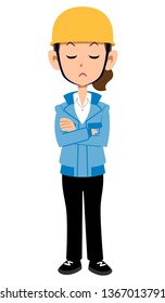 Worker in a construction site who thinks with arms folded