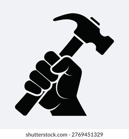 Worker hand holding hammer, tool of trade, labor movement, industry, construction, strength, empowerment.