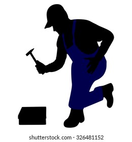 Worker holding a hammer