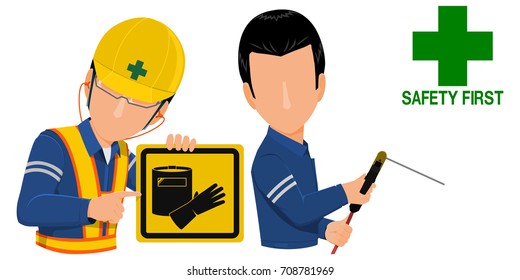 Worker is holding warning sign for the welder

