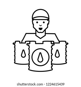 worker with pile barrels of gasoline