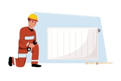 Worker in a protective helmet carefully prepares a heating system, ensuring all components are correctly installed 