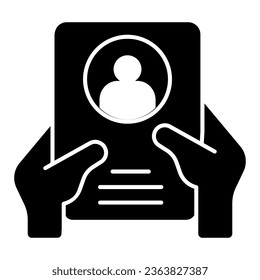 Worker questionnaire in hands solid icon, labour day concept, worksheet with photo sign on white background, Hand holding clipboard icon in glyph style for mobile and web. Vector graphics