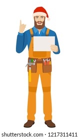 Worker in Santa hat holding a a paper and pointing up. Full length portrait of worker in a flat style. Vector illustration.