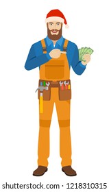 Worker in Santa hat pointing at money in his hand. Full length portrait of worker in a flat style. Vector illustration.