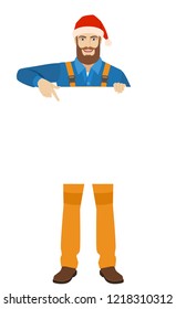 Worker in Santa hat pointing at white blank poster. Full length portrait of worker in a flat style. Vector illustration.