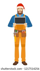 Worker in Santa hat showing blank digital tablet PC. Full length portrait of worker in a flat style. Vector illustration.