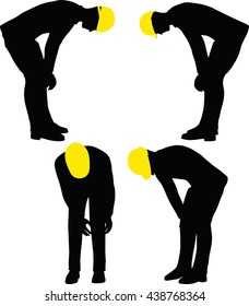 worker silhouette with yellow protective headgear isolated