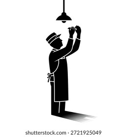 A worker in uniform changing a light bulb on a hanging lamp.