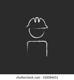 Worker wearing hard hat hand drawn in chalk on a blackboard vector white icon isolated on a black background.