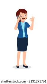 worker woman talking using smartphone and show ok gesture