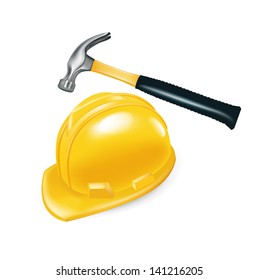 worker's hard hat and hammer isolated
