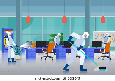 Workers in hazmat or biohazard suits sanitizing an office with sprays and sweeping. The office has blue desks, orange chairs and lamps, and large windows in the back of the room.