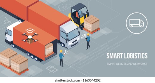 Workers Loading Products On The Trucks And Tracking Delivery With A Tablet: Smart Logistics And Transportation Concept