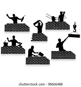 Workers silhouettes close-up and construction wall