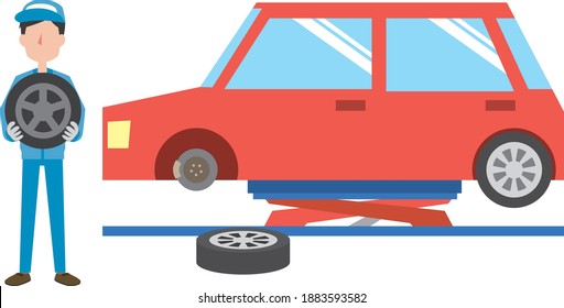 Trabajadores que retiran las ruedas delanteras del coche rojo y reemplazan los neumáticos