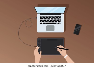 Workflow of vector illustrator or designer at workplace with laptop and graphics tablet, top view of workplace, graphics tablet, phone and dried flowers, female hands drawing on graphics tablet