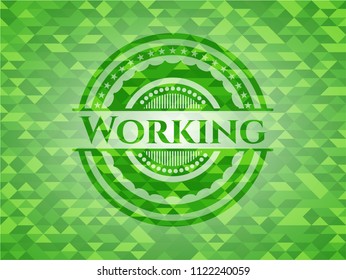 Working green emblem. Mosaic background