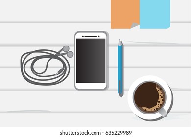 working place smart phone coffee cup,pen,earphone paste paper on desk wood