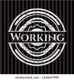 Working silvery badge or emblem