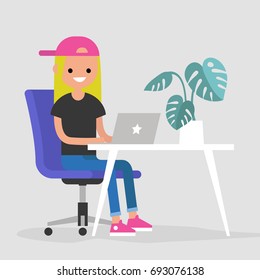 Working space. Young female character typing on a laptop / flat editable vector illustration, clip art