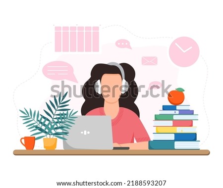 Working or studing at home. Girl sitting at table. Online education concept. Freelance.