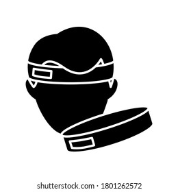 Workout headband black glyph icon. Sportswear for fitness training. Gym equipment silhouette symbol on white space. Sportive headwear for sweat protection. Sweatband vector isolated illustration