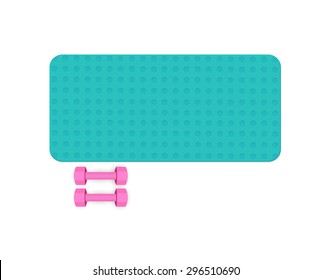 A workout mat with a pair of dumbbells