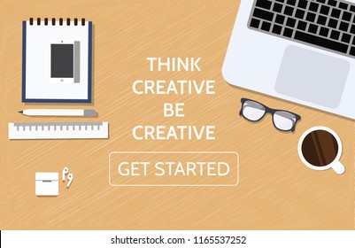 Workplace for business, management and IT. View from above. Laptop, mobile phone, notebook and office supplies on the desktop