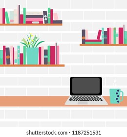 Workplace. Computer and bookshelves on a brick wall