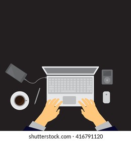 Workplace concept. Top view laptop, notebook, pencil, mobile phone, hands,Blalck background