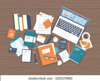 Workplace Desktop background. Top view of wooden table, laptop, books, folder with documents, notepad, business card, purse, calendar, headphones, glasses, books, pencil, coffee with croissants Vector