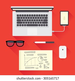 workplace with the laptop and themed icons
