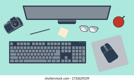 Workplace with monitor, keyboard, mouse, mouse pad, pencil, glasses and a camera. Vector flat illustration