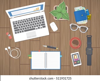 Workplace in office. Work in a team, Work activity. Office work equipment on a wooden table. Laptop, notepad, pen, smart watches, phone, wallet, flash drive, headphones, coffee. Top view. Vector
