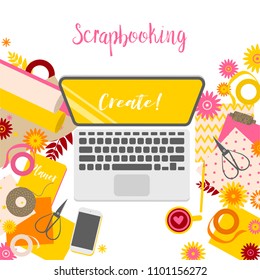 Workplace of scrapbooking master, view from above, desktop, paper, flowers and laptop