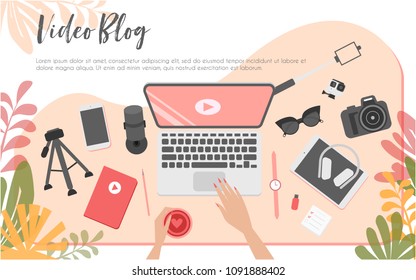 Workplace of video blogger, view from above, desktop, laptop, action camera, phone, selfish stick, flash drive, tripod and arms