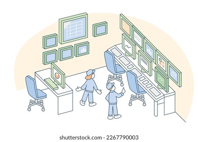 Workroom in the building.
People working on computers.