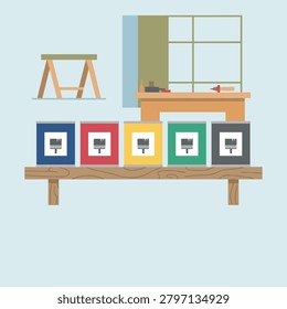 Workshop shelf holding five colorful paint cans with brush symbols in front of carpenter workbench.