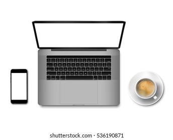 Workspace with laptop smartphone and fresh coffee