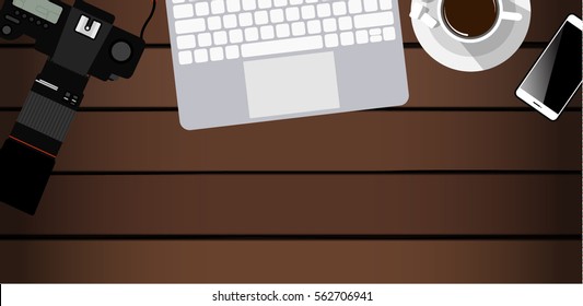 Workspace of photographer. Top view with textured table, photo camera, laptop, smartphone and coffee mug. Flat design. Vector illustration with clipping mask.