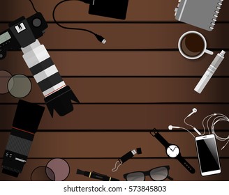 Workspace of photographer. Top view with textured table, photo camera, lens, smartphone, notepad and portable hard drive. Flat design. Vector illustration with clipping mask.