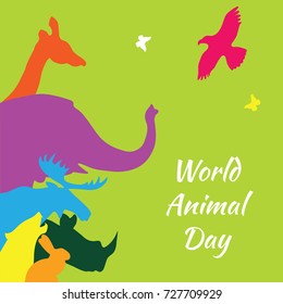 World animal day. Vector illustration of colorful animal silhouettes on a green background