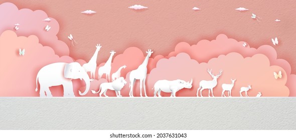World Animals Day in pink background with deer, elephant, lion, giraffe, rabbit, rhinoceros in Paper art, paper cut and origami craft style. Illustration world animal wildlife day in paper texture.