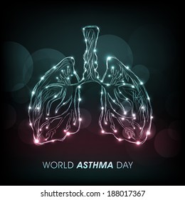 World Asthma Day concept with shiny lungs on abstract green background. 